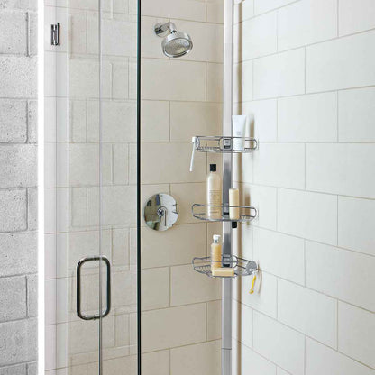 Angled view of Simplehuman Tension Shower Caddy, White/Polished Stainless Steel, adjustable shelves for maximizing vertical shower storage.