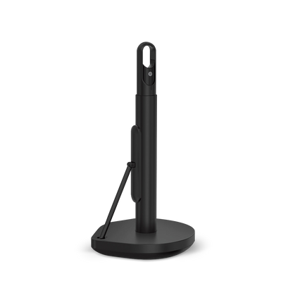 Angled view of Simplehuman Matte Black Paper Towel Holder showing spray bottle holster and tear arm.